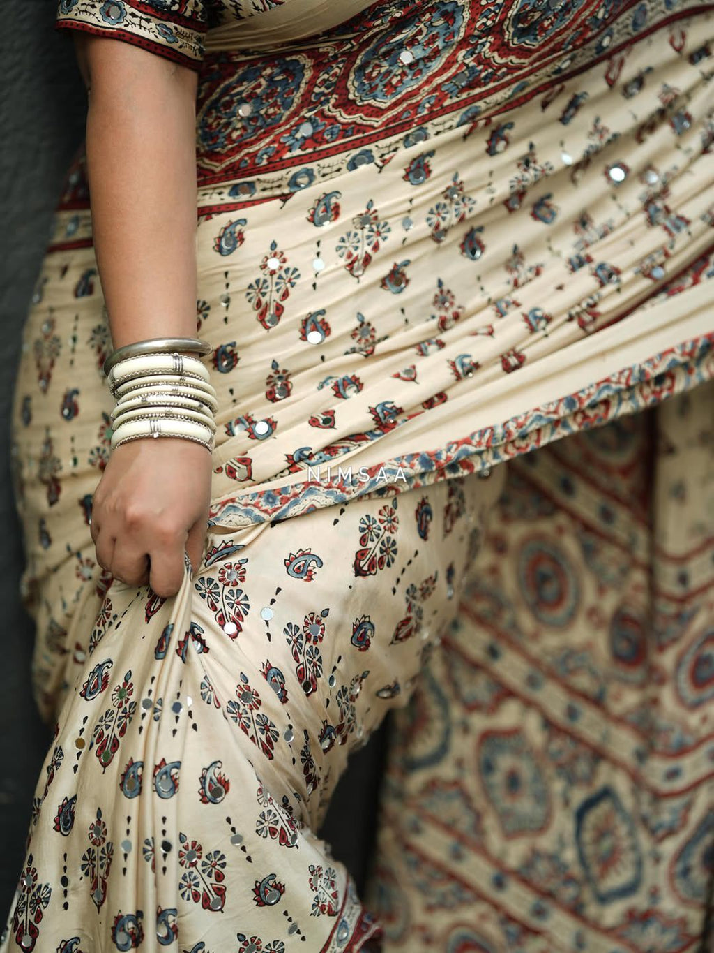Ivory Modal Silk Ajrakh Printed Saree with Traditional Floral Motifs, Heritage Border & Tassel Detailing